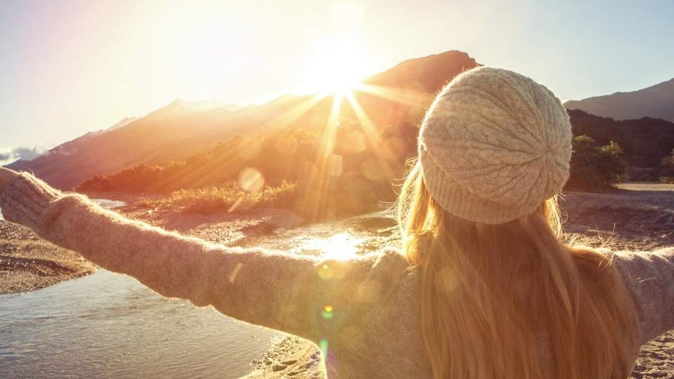 Do Sober Living Homes Need to Be Licensed? 2 Do Sober Living Homes Need to Be Licensed a woman pondering this question as she looks towards the sun.