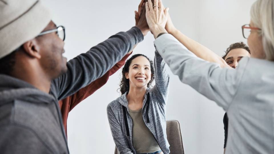 who pays for sober living homes? members of sober living interacting with each other